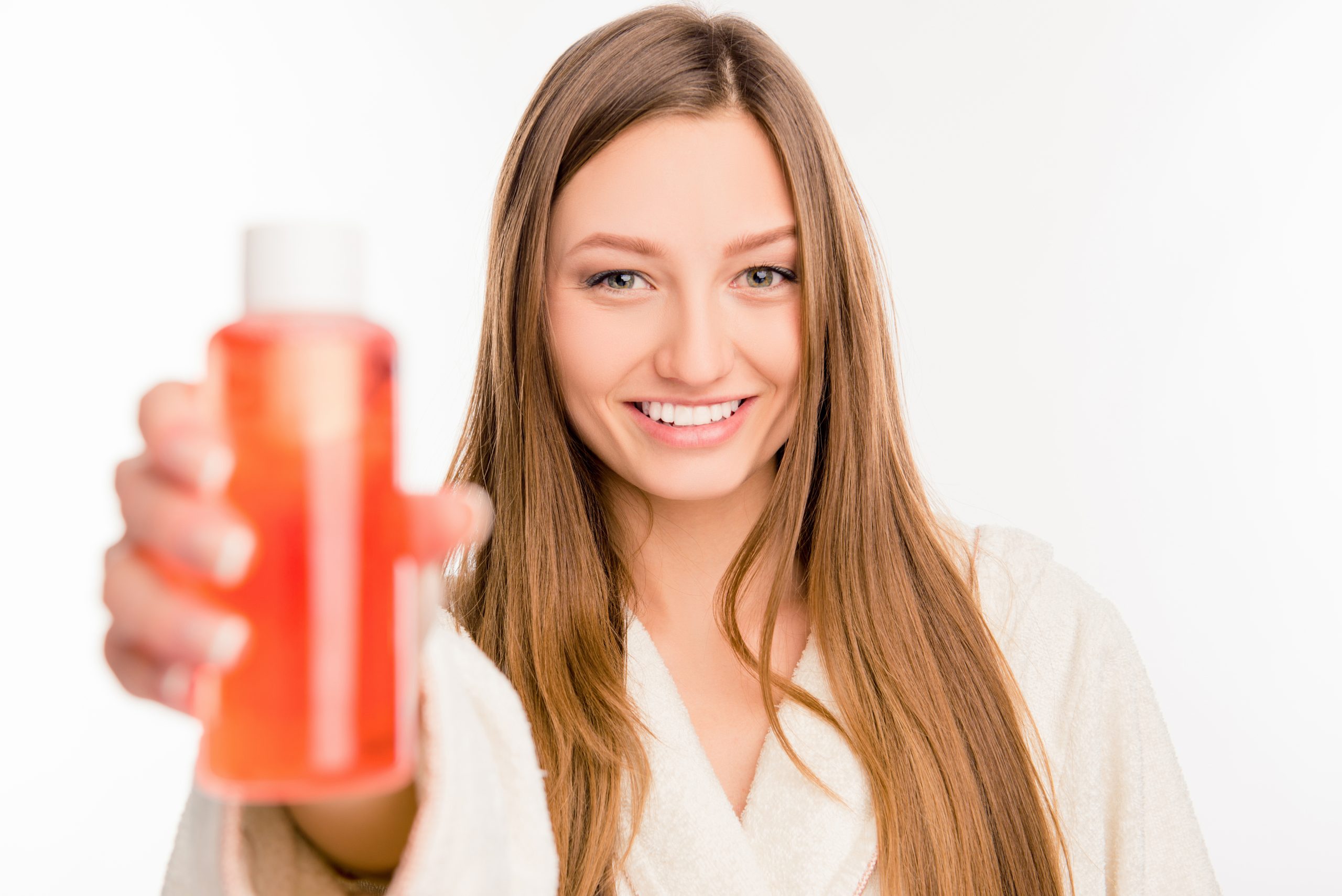 A minimalist product shelf with the label “Hair Growth System.”