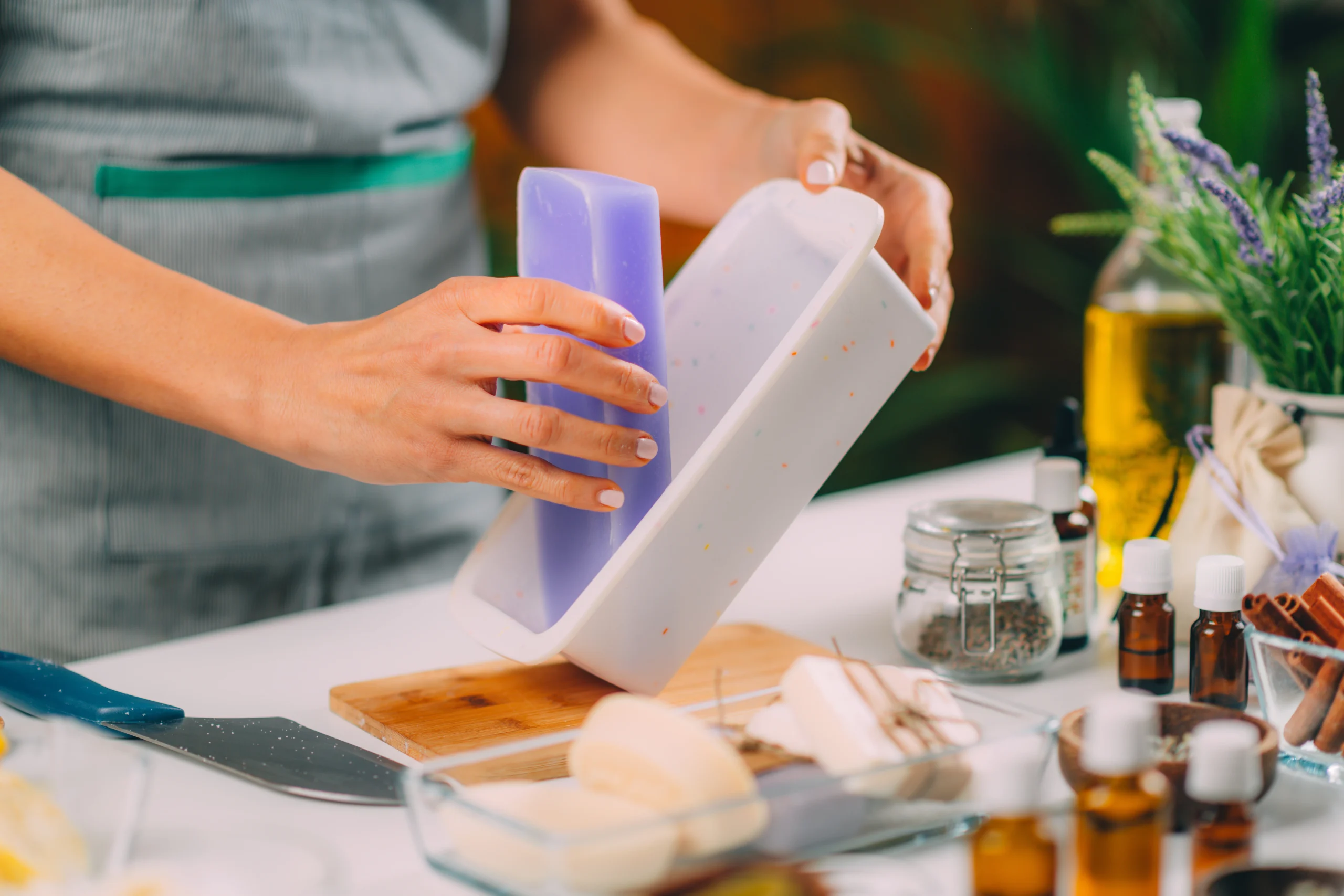 Unmolding lavender Castile soap with essential oils and herbs for gentle feminine hygiene care.