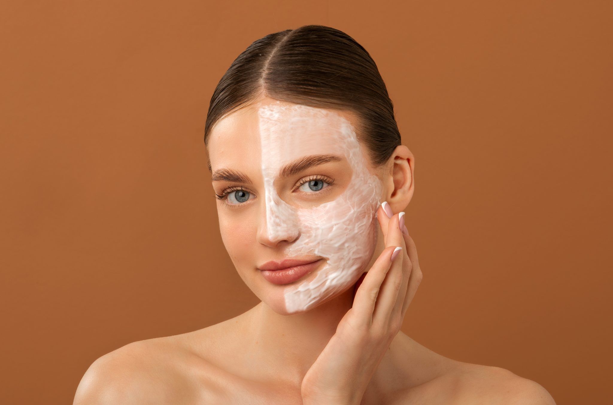 Applying a hydrating face mask for glowing and healthy skin.