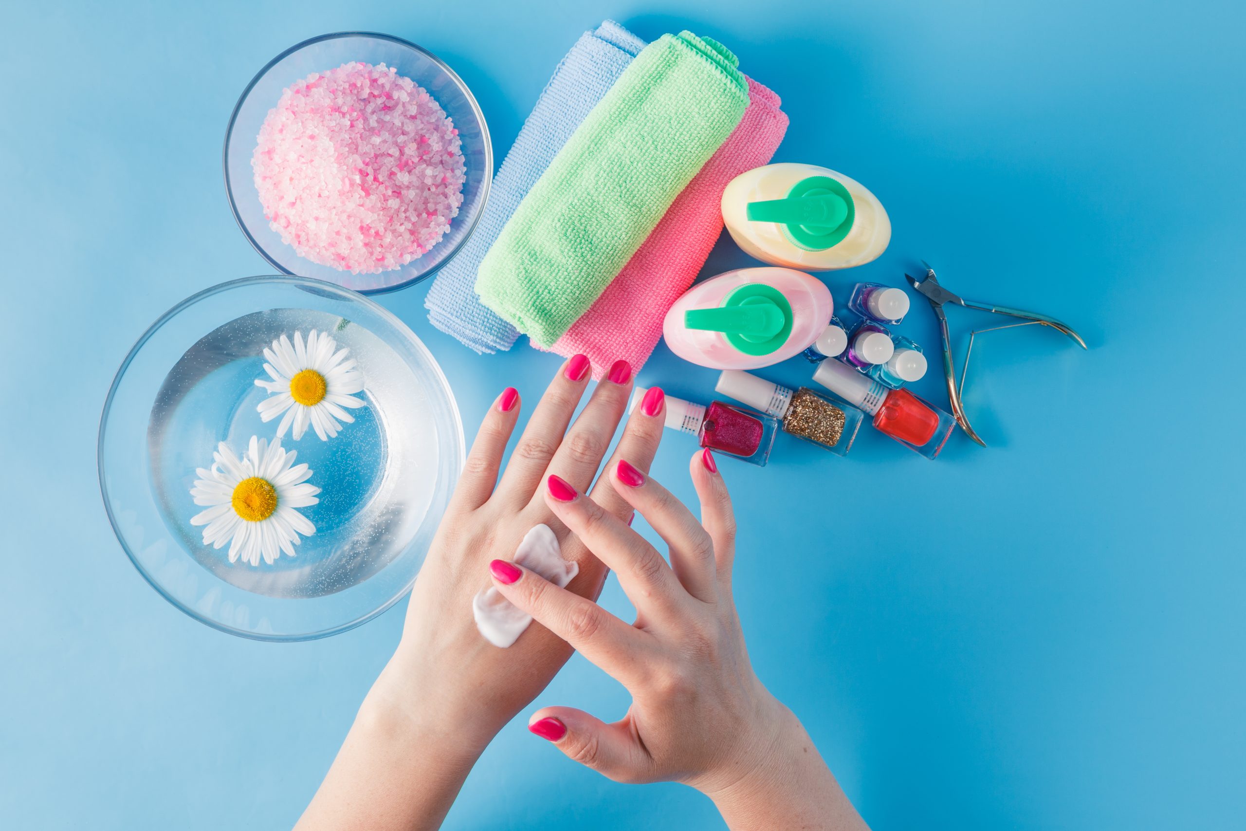 Elegant hands with a fresh French manicure and white nail tips