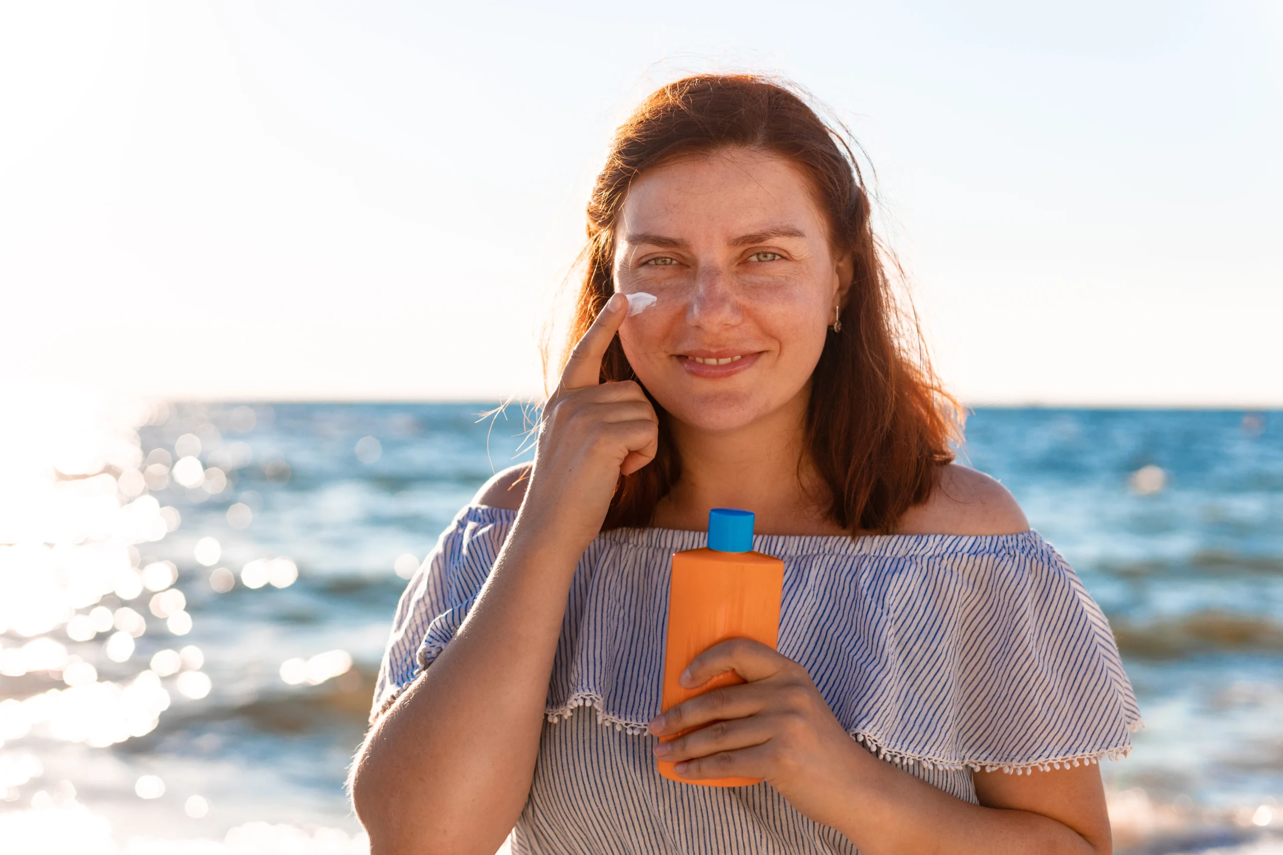 Person wearing loose cotton dress for comfort and healing after sun care.
