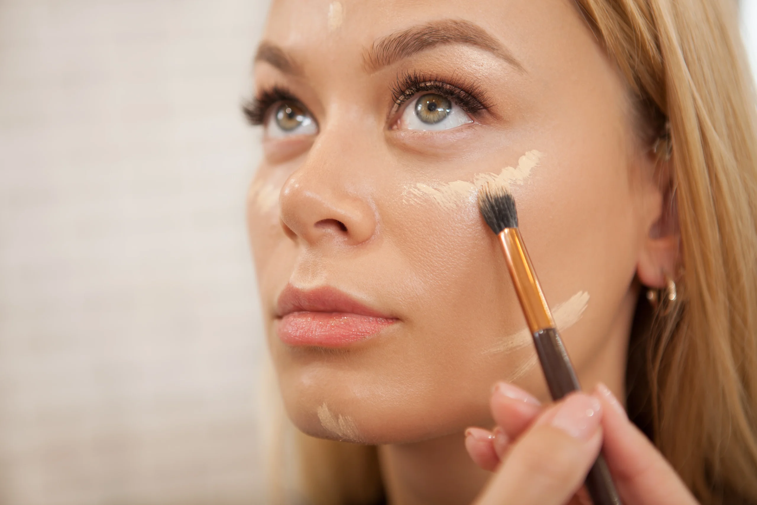 Hydrating makeup primer for dry skin creating a smooth radiant base.