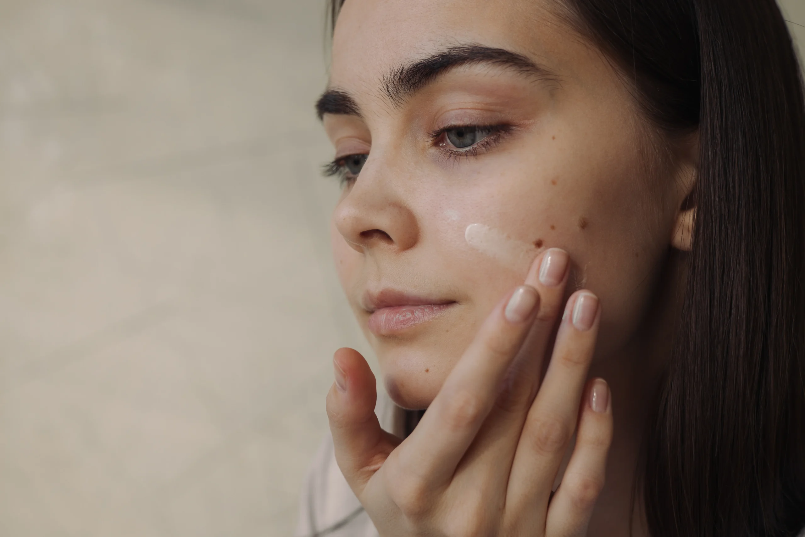 Matte finish tinted sunscreen designed to control oil on acne-prone skin.