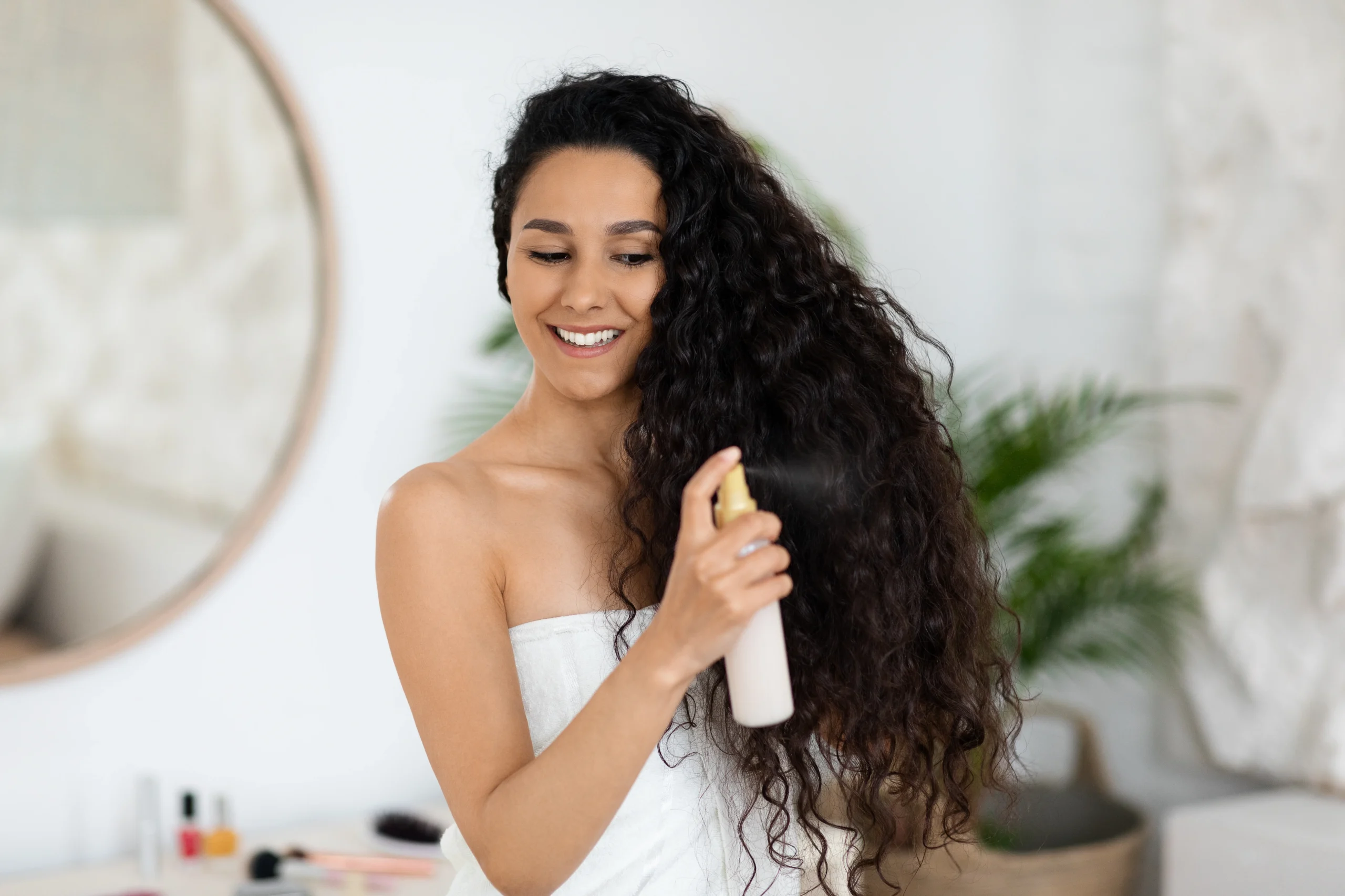 Collection of hair care products designed for wavy hair.