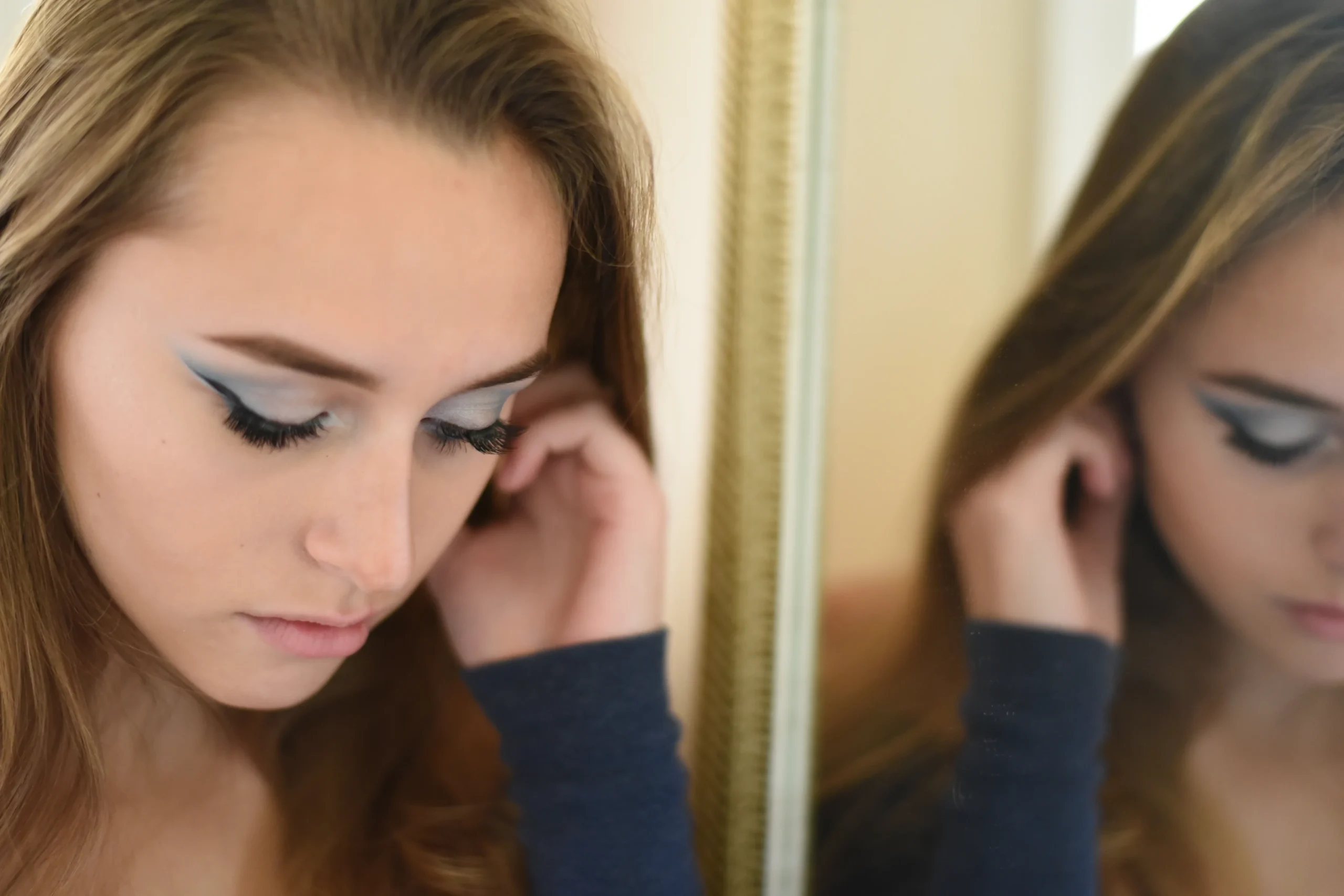 Eyeshadow applied above the crease for hooded eyes to enhance shape.