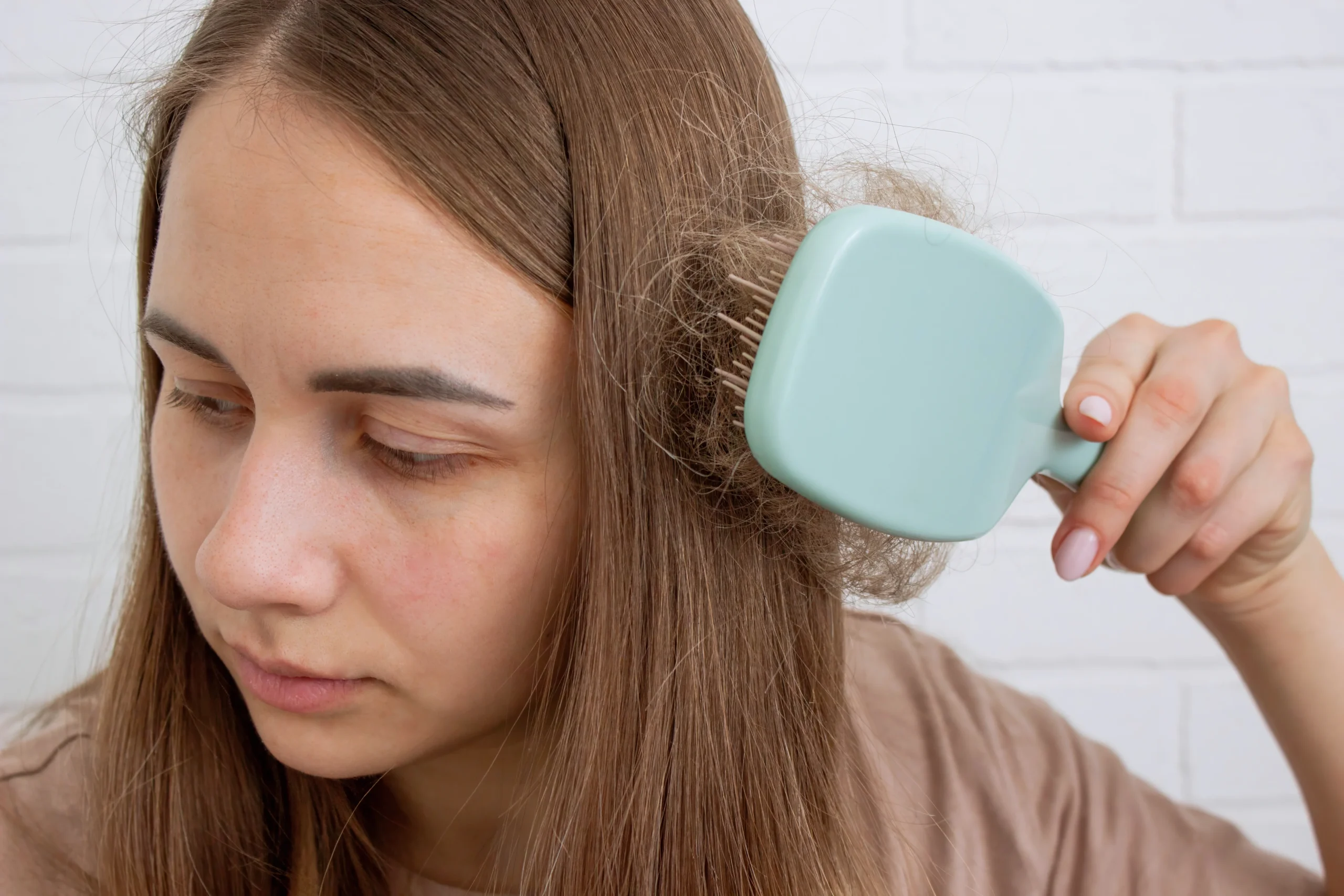 Dry, brittle hair damaged by chlorine before treatment