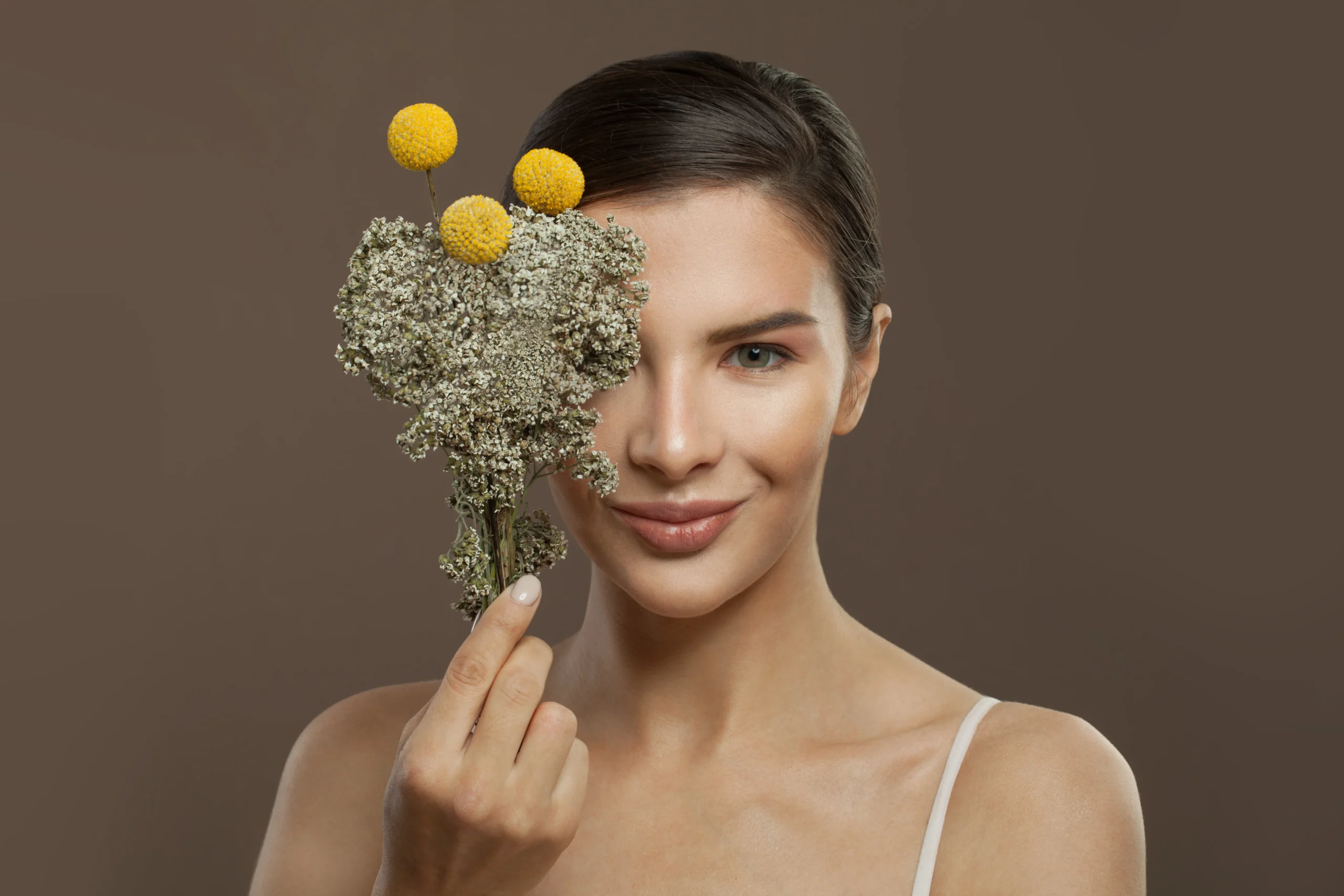 Botanical ingredients including turmeric, chamomile, and green tea used in the best natural face care routine.